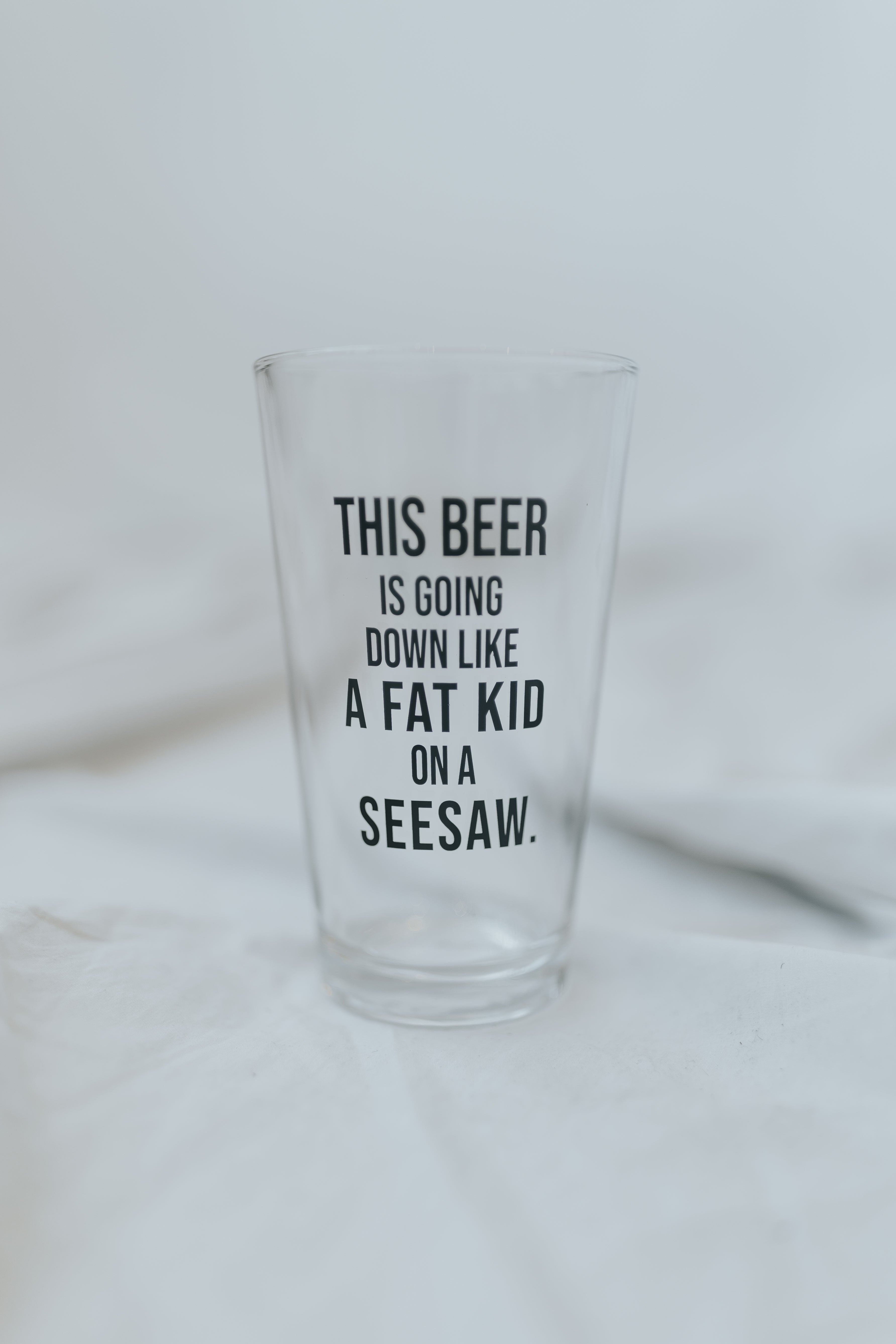 Fat Kid On A Seesaw Pint Glass