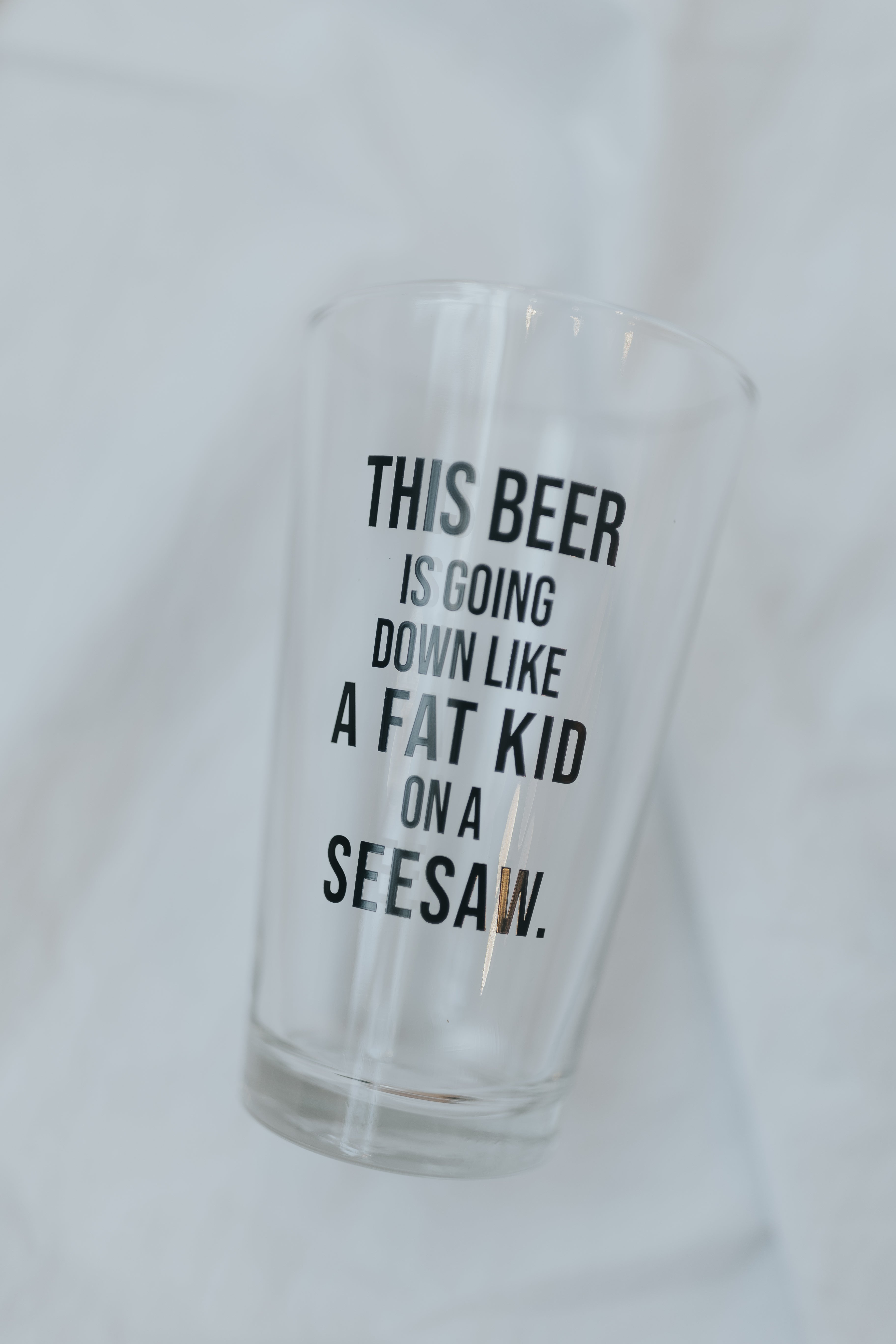 Fat Kid On A Seesaw Pint Glass
